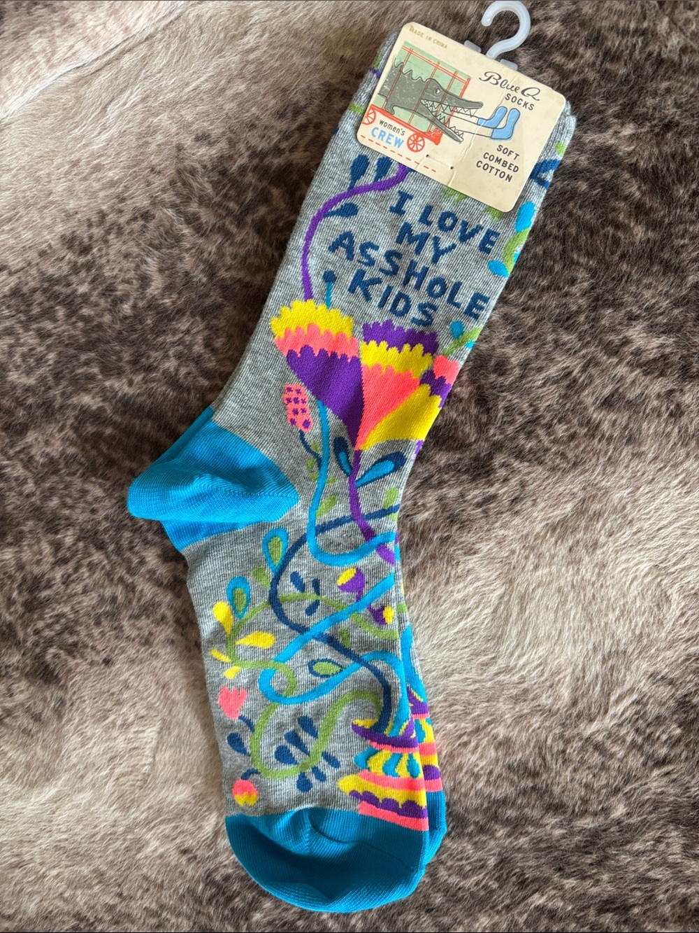 Blue Q Gray Crew Socks with Bright Floral Graphic and Teasing Text